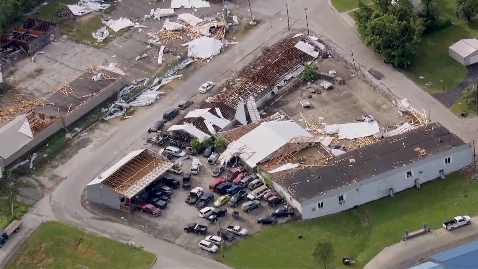 Tens of thousands still without power after deadly storms as a new wave of severe weather and flooding hits